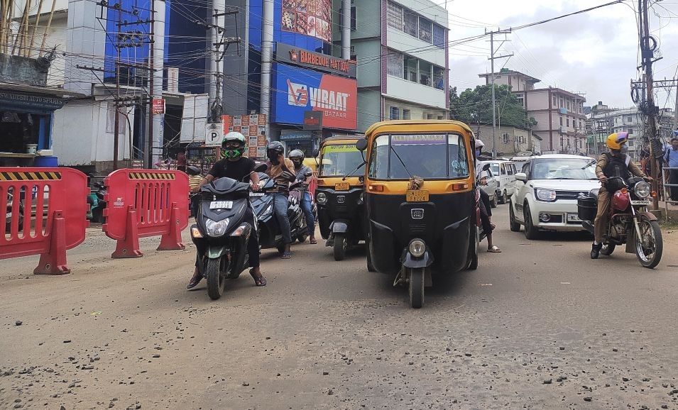 Vehicles wait at a traffic stop in Dimapur. With the announcement of the first phase of unlock from July 1 to 10, the commercial hub of the State has witnessed increased activity over the past few days. The State government on Thursday announced Unlock 2.0 from July 11 to 17 with further relaxations. (Morung Photo)